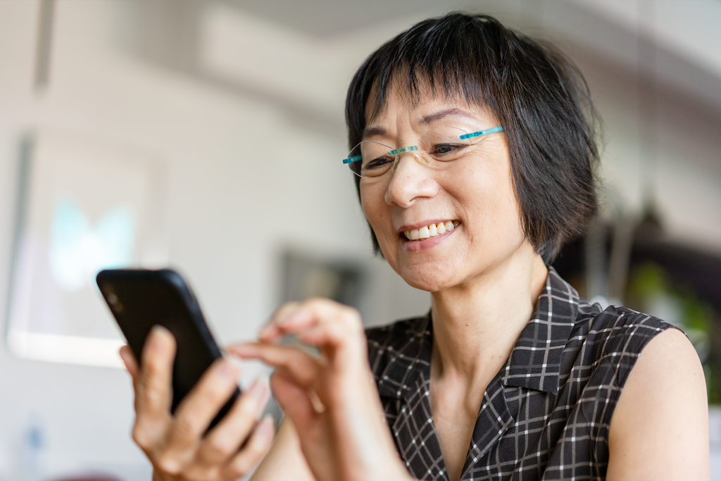 women looking at phone